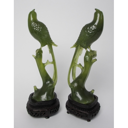 796 - A pair of Chinese jadeite models of peacocks