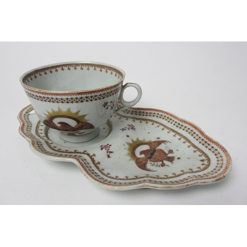 804 - A Chinese export or Samson armorial cup and sandwich saucer