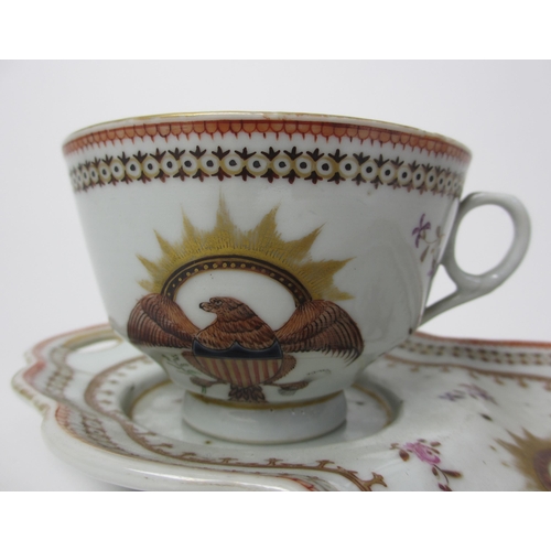 804 - A Chinese export or Samson armorial cup and sandwich saucer