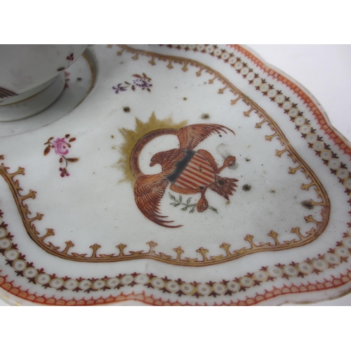 804 - A Chinese export or Samson armorial cup and sandwich saucer