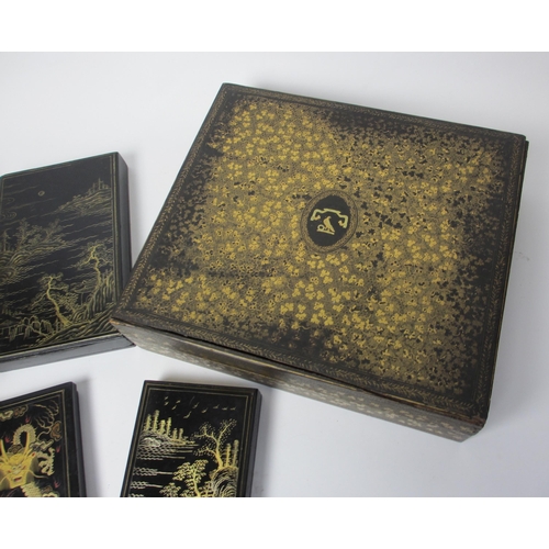 808 - Three Chinese black and gold lacquered rectangular boxes