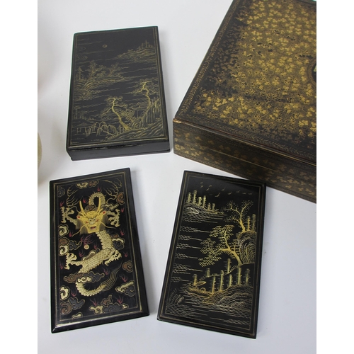 808 - Three Chinese black and gold lacquered rectangular boxes