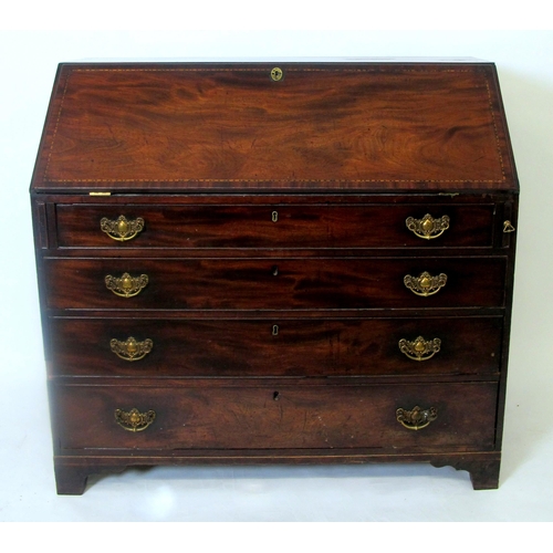 831 - A Georgian mahogany inlaid writing bureau