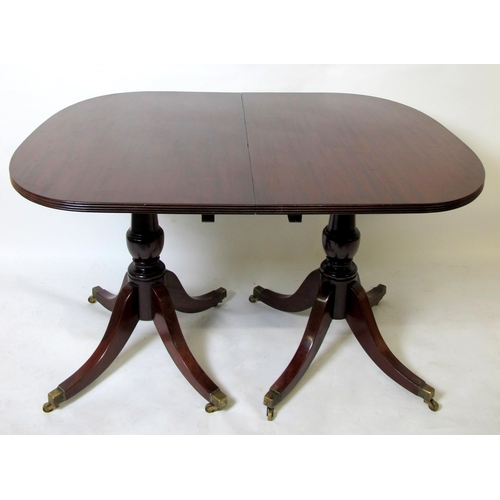 896 - A mahogany twin pedestal dining table