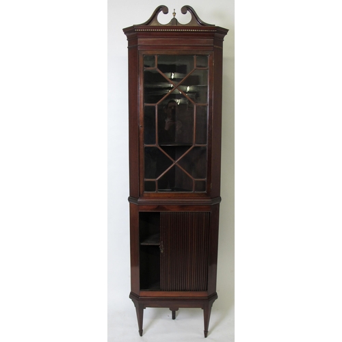 909 - An Edwardian mahogany corner cabinet on stand