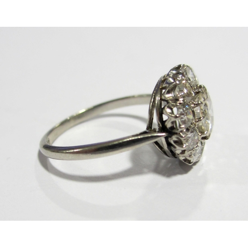 92 - A platinum diamond cluster ring  with approximately 0.75 carat rose cut diamond