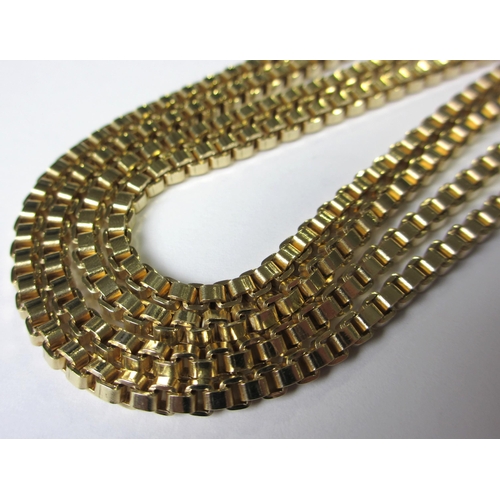 110 - A nine carat gold box link guard chain.