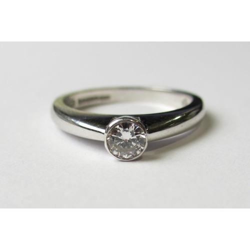 61 - An eighteen carat white gold diamond solitaire ring