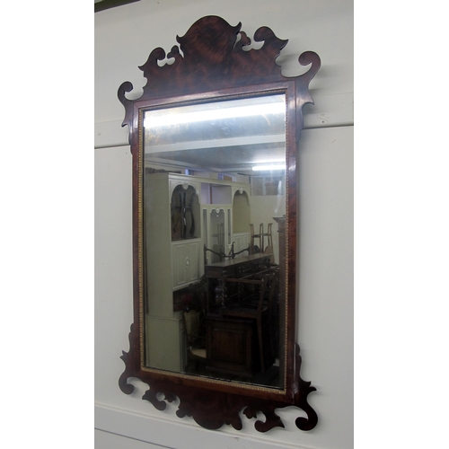 810 - An early 20th Century George III style mahogany wall mirror