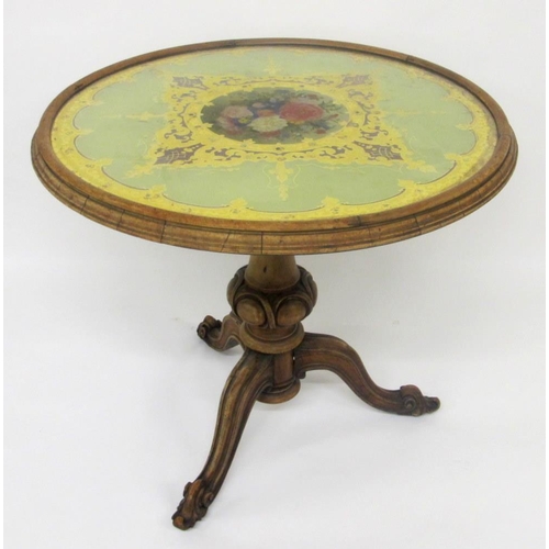 812 - A Victorian walnut circular window table