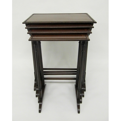 813 - An Edwardian mahogany inlaid nest of four 'Quarteto' tables