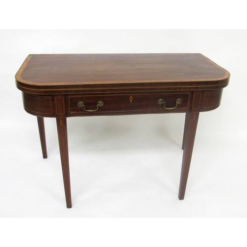 831 - An Edwardian mahogany inlaid turnover tea table