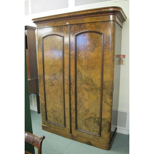 855 - A Victorian burr walnut two door wardrobe