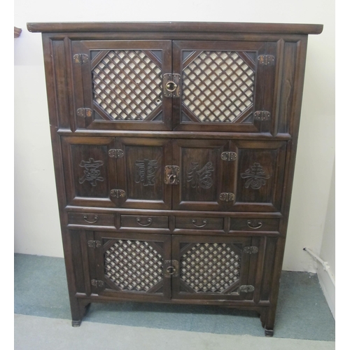 867 - An oriental hardwood cupboard chest