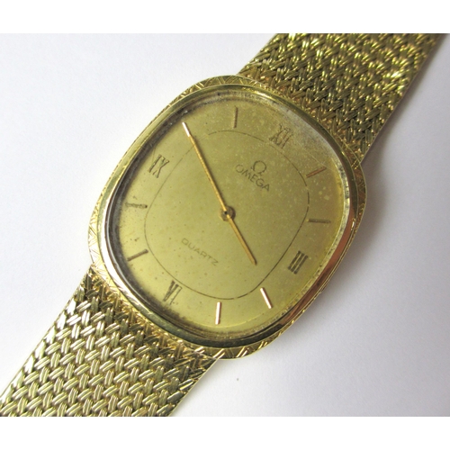 90 - A gents 18 ct gold Omega Quartz wrist watch