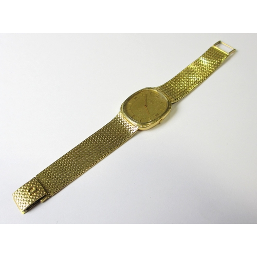 90 - A gents 18 ct gold Omega Quartz wrist watch