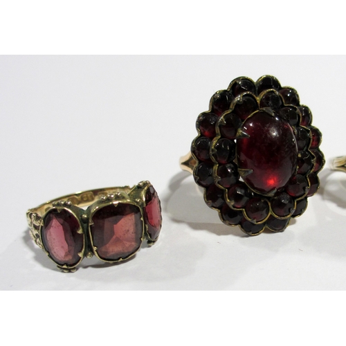 10 - A marquise shaped garnet cluster ring