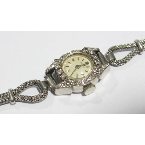 105 - A ladies diamond wrist watch by Girard Perregaux