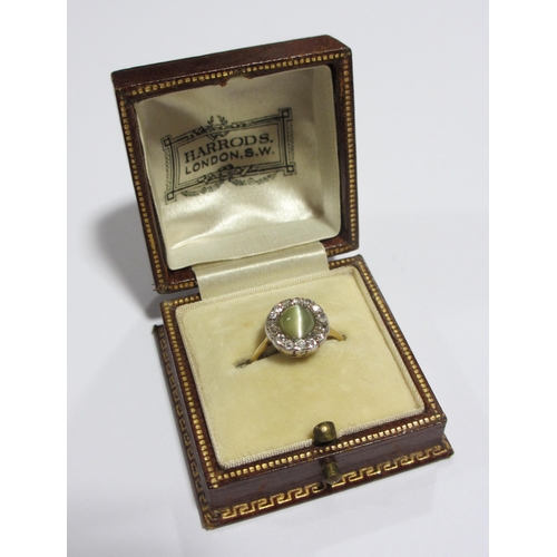 118 - An Edwardian cats eye and diamond ring