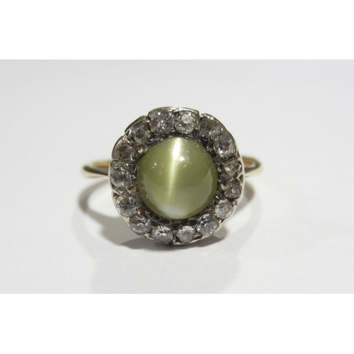 118 - An Edwardian cats eye and diamond ring