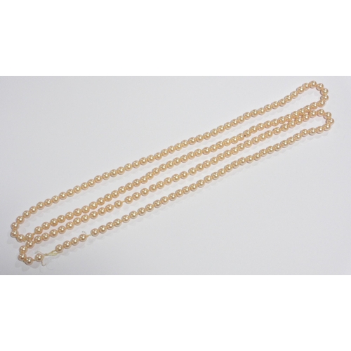 121 - Two strands of cultured pearls