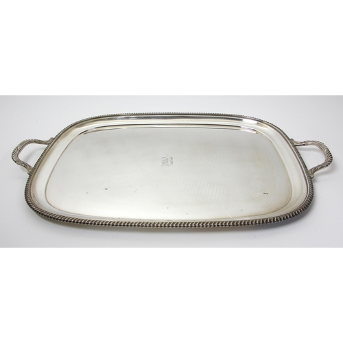 136 - A silver twin handled serving tray