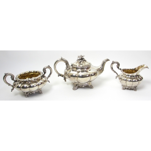 140 - A composite three piece silver tea service