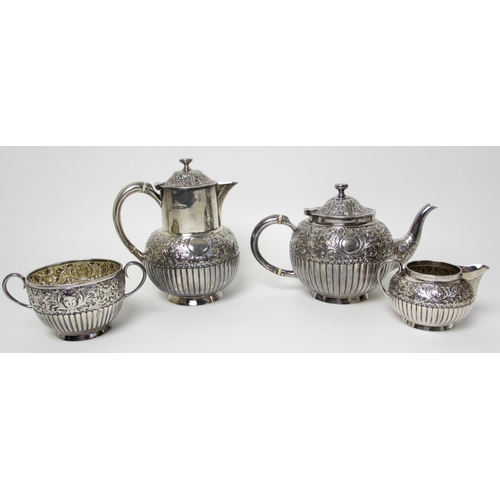 145 - A matched four piece silver tea service