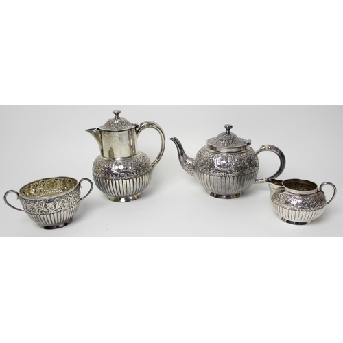 145 - A matched four piece silver tea service