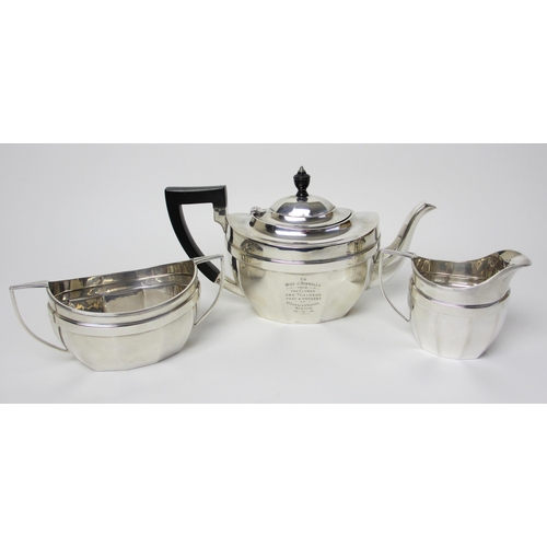 146 - A three piece silver tea service