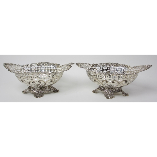 147 - A pair of silver fruit baskets