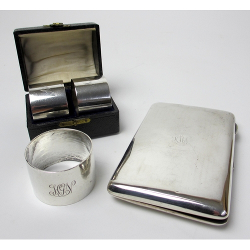 161 - A cased pair of silver napkin rings