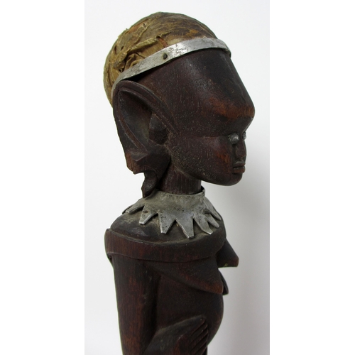 225 - A North Yoruba votive carved wood female figure