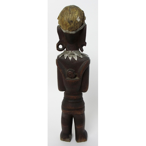 225 - A North Yoruba votive carved wood female figure