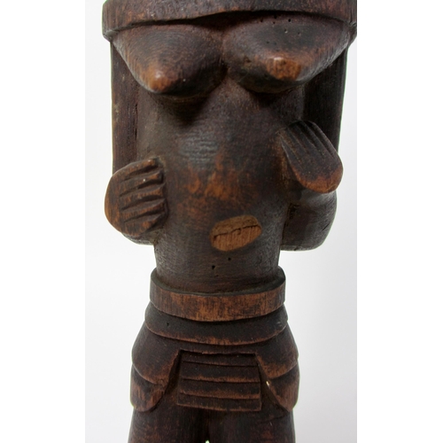 225 - A North Yoruba votive carved wood female figure