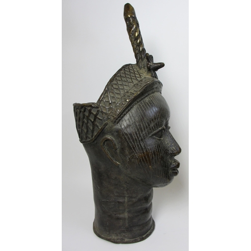 227 - A pair of Benin bronze heads of the Oba and Queen Consort