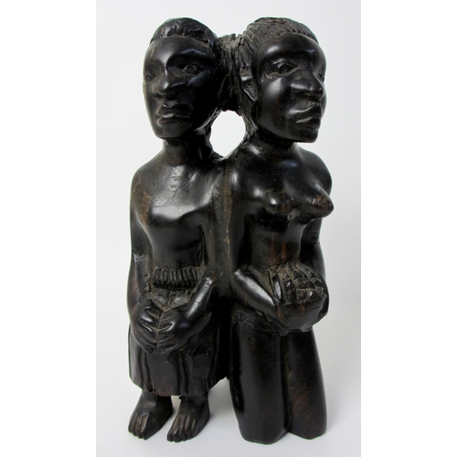 228 - A West African ebony carving of the twins