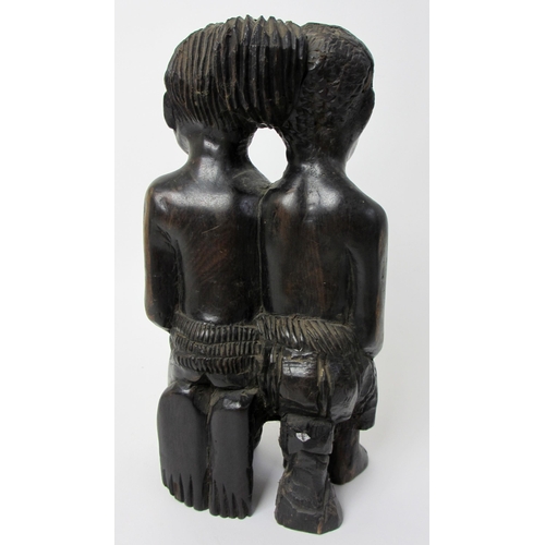 228 - A West African ebony carving of the twins