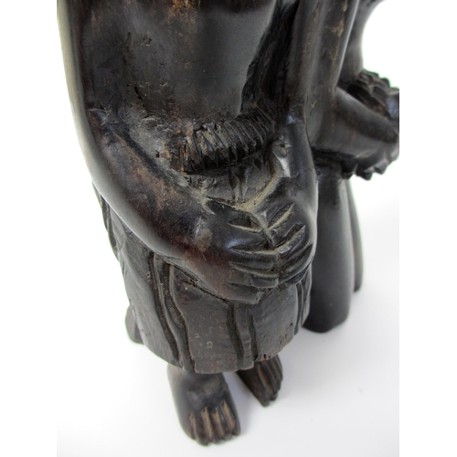 228 - A West African ebony carving of the twins