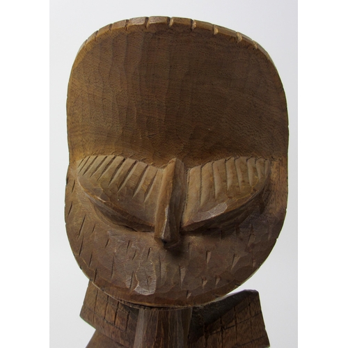 229 - A East African wood carving of a bird like figure