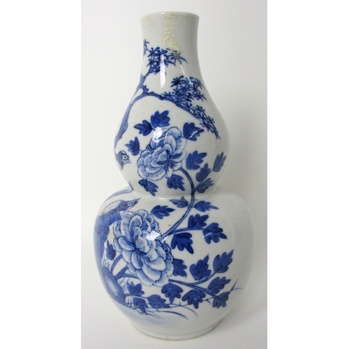 244 - A Chinese blue and white double gourd vase