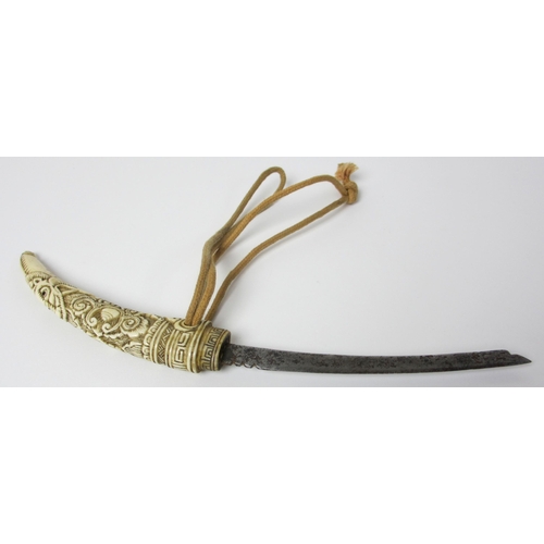 246 - A Japanese carved ivory dagger