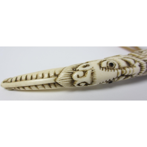 246 - A Japanese carved ivory dagger