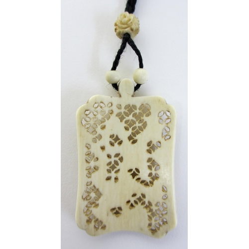 247 - A Chinese carved ivory pendant