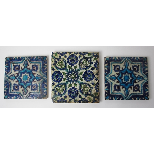 262 - Two Persian blue and white moulded tiles