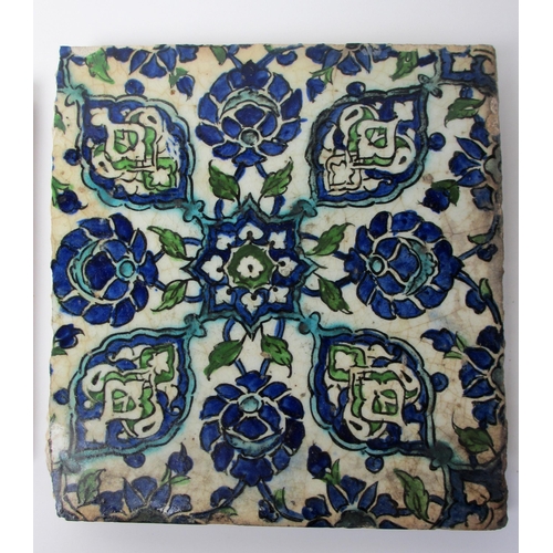 262 - Two Persian blue and white moulded tiles