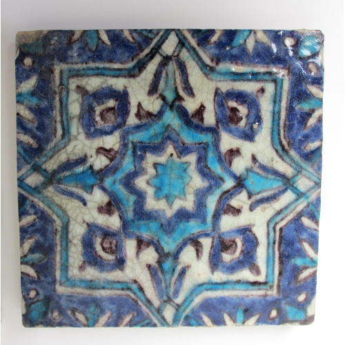 262 - Two Persian blue and white moulded tiles