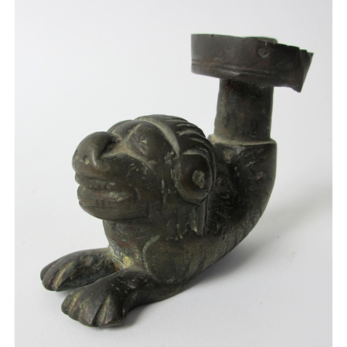 265 - A bronze aquamanile chair leg support