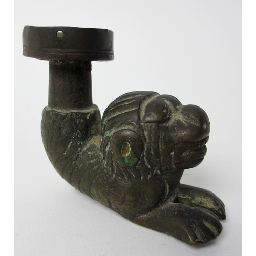 265 - A bronze aquamanile chair leg support