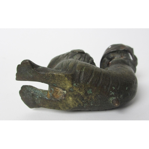 265 - A bronze aquamanile chair leg support